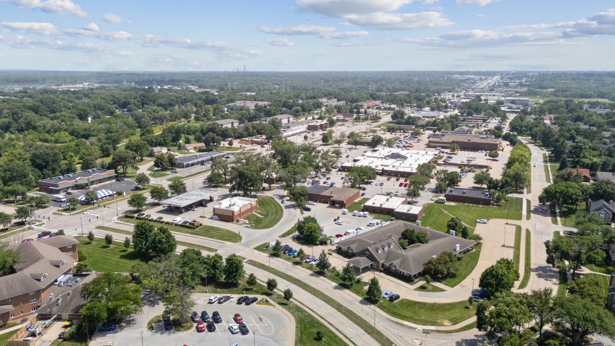 Aerial view showing shops and services near the facility