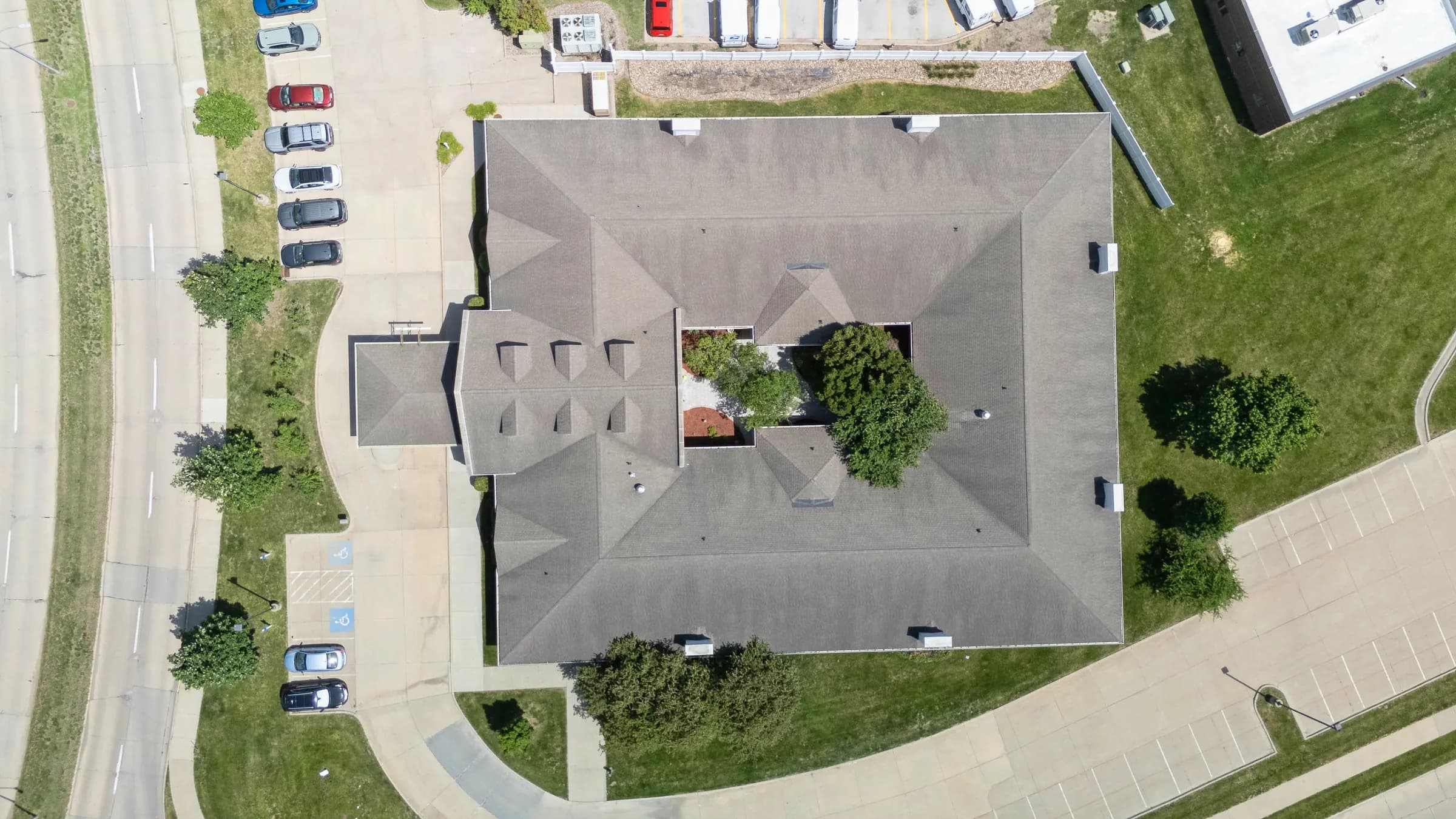 The building wraps a private central courtyard